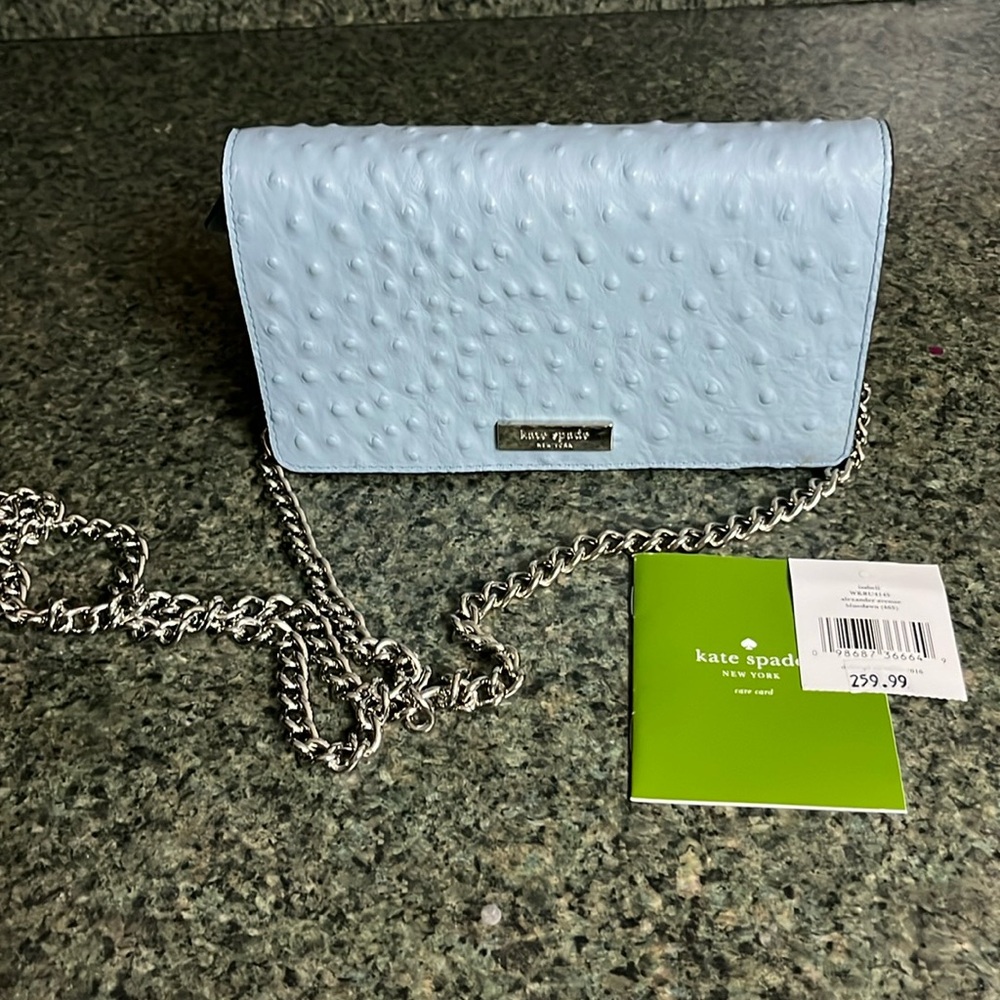 Kate Spade leather cross body/clutch
Color: blue